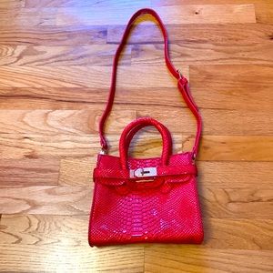 Cute red bag good for any occasion.